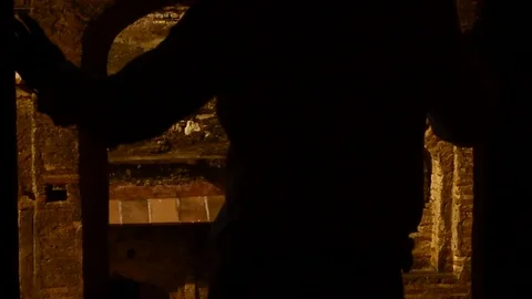 Man standing at window of old fort Video stock 104403871