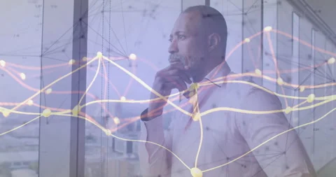 Man standing at window viewing skyline while pulsing network graph boosting data Stock Footage 311519356