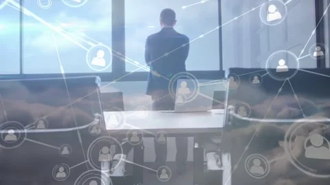 Man standing at window watching clouds appearing and nodes spreading, showing Stock Footage 334112370