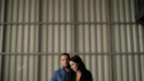 Man stands behind a woman's back Stock Footage 105146858