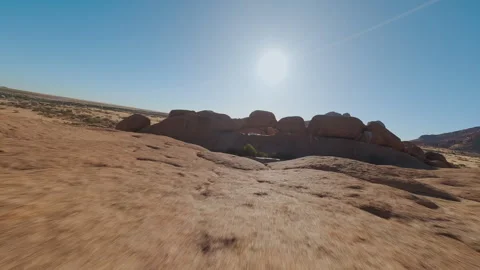 A Man Stands Between Rocks Stock Footage 297254745
