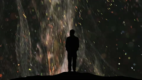 The man stands on a flying cosmic particles background Video stock 165354085