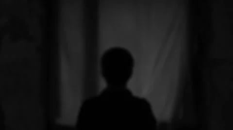 A man stands in front of the moon Stock-Footage 65188385