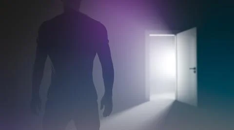 A man stands in front of an open door Stock-Fotos