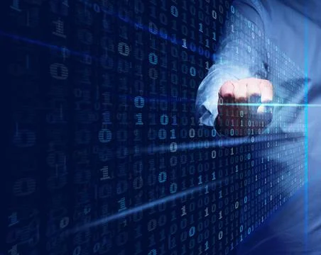 A man stands in front of a virtual screen with a binary code. Data verificati Stock Photos