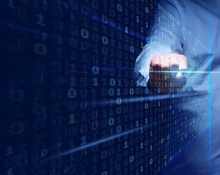 A man stands in front of a virtual screen with a binary code. Data verific... 库存照片