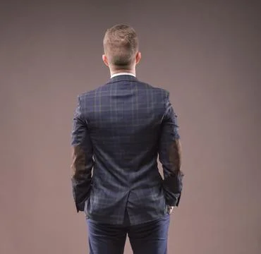 Man stands with his back to the camera Stock Photos