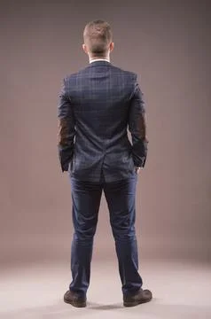 Man stands with his back to the camera Stock Photos