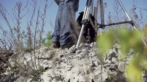 Man stands on the ruins close-up Stock Footage 72104007