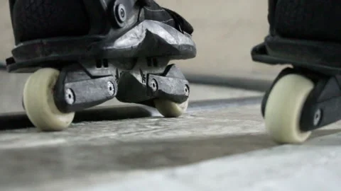 Man stands on the training ground in roller skates Video stock 102150210