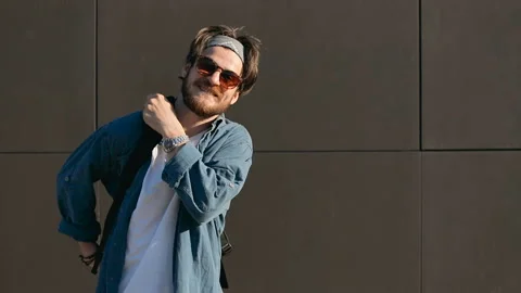 Man Stands before the Wall Stockbeeldmateriaal 91792507