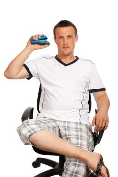 Man with a stapler in hand Stock Photos