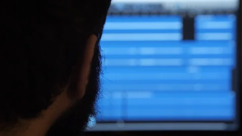 A man staring at his computer's screen Видео 90784349