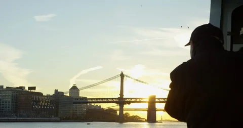 Man Staring At The Sunset On Manhattan Bridge At Evening On Hudson River Stock Footage 112183494