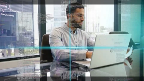 Man starting checking and scanning paper, typing on laptop as HUD overlays Stock Footage 333317846