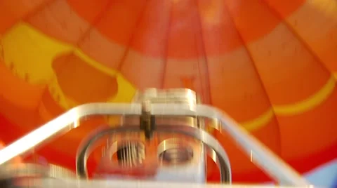 Man starting engine of hot air balloon Stock Footage 55570095