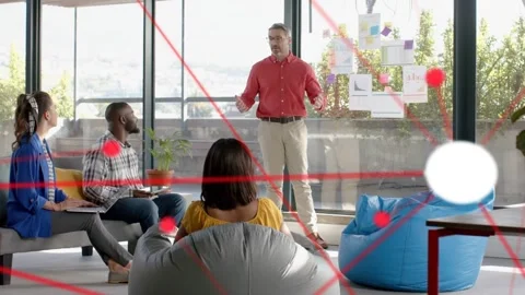 Man starting explaining in design meeting, team listening while red overlay Stock Footage 333059205