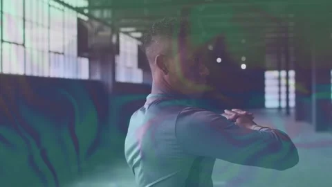Man starting fit prep by windows, moving crossarm to overhead hold with ripple Stock Footage 323408456