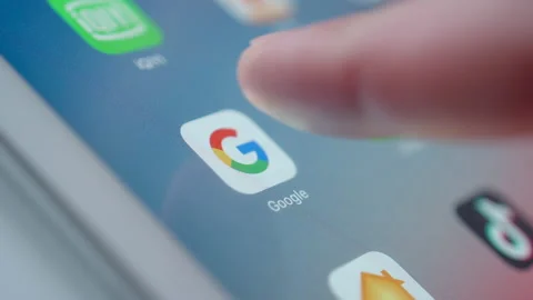 Man Starting Google Search App On Tablet PC Видео 141706225