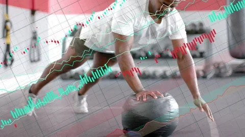 Man starting high plank left hand on med ball, doing pushups for fitness, Stock Footage 333277886