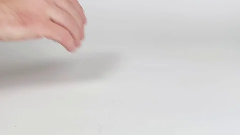 Man starting a jenga tower in slow motion Stock Footage 129042277