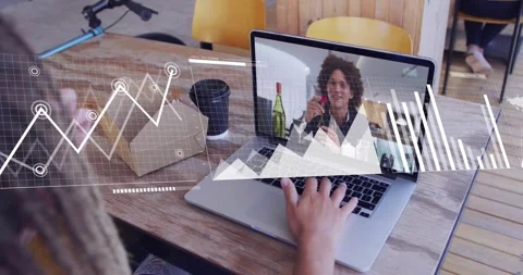 Man starting laptop call at cafe table, peer showing red fruit initiating data Stock Footage 328255668