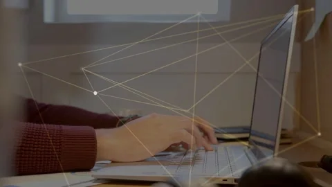 Man starting typing from rest, animated network drifting over hands and laptop, Stock Footage 333859681