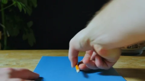 Man starting to write a book, studying for education   Stock Footage 85680120