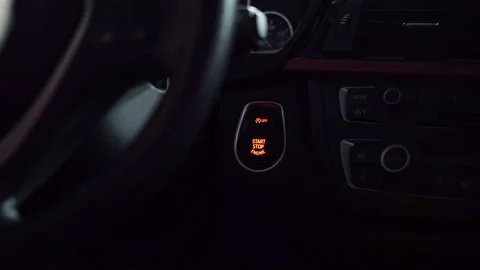 Man starts a car with a button Start and Stop Engine Stock Footage 112627534