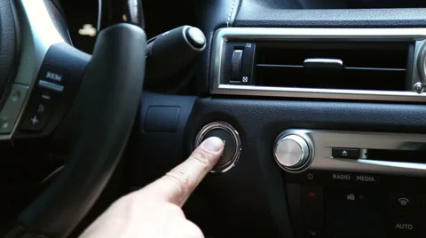 The man starts the car engine with the button Vídeo Stock 55387464