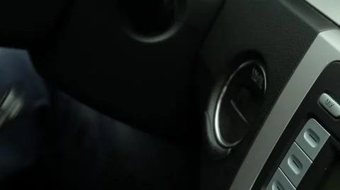 Man starts the car with key Stock Footage 64587091