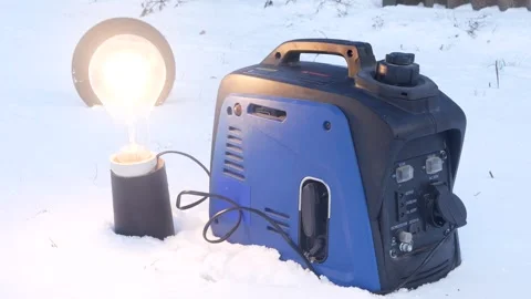 A man starts a hand-held portable gasoline generator, which produces electri Stock Footage 295772305
