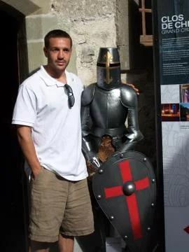 Man with Statue of Armor 스톡 사진