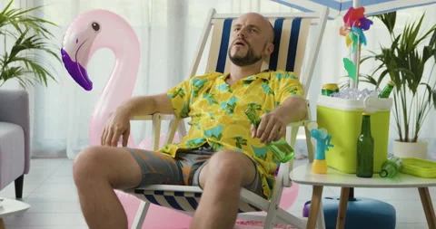 Man staying at home and suffering from heat Stock Footage 162379929