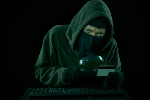 A man stealing credit card code Foto stock