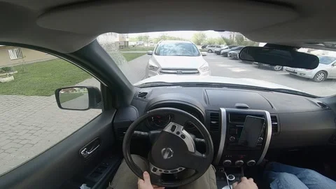 Man steering driving car point of view Stock Footage 164434547