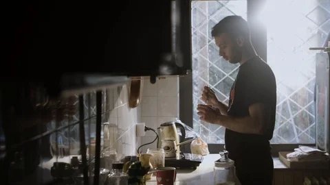 Man Steering His Cup Of Coffee And Smells The Aroma Stock Footage 88808910
