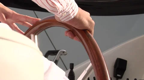 A man steering a sailboat. Stock Footage 46863469