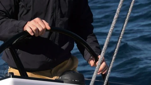 Man steering a sailing boat. Stock Footage 82277961