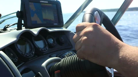The man steers the boat Stock Footage 49683716