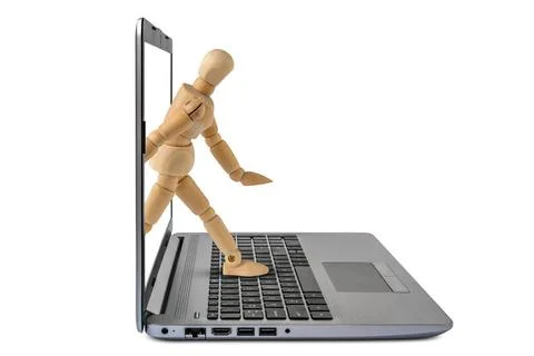 Man steping out of laptop computer screen Man steping out of laptop comput... 스톡 사진