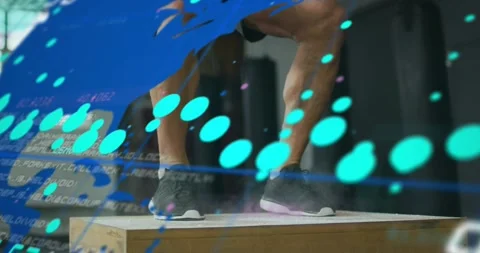 Man stepping into crouch, jumping onto plyo box, teal numeric readouts Video stock 323431868