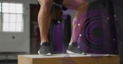 Man stepping, crouching, initiating box jumping in gym for training, purple HUD Stock Footage 330936074