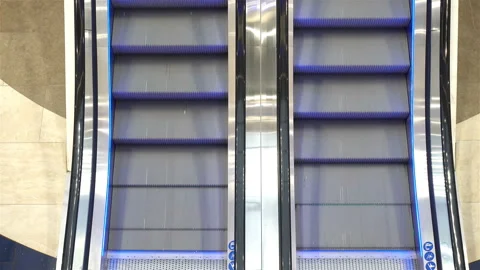 Man stepping off escalator in 4K Stock Footage 126621732