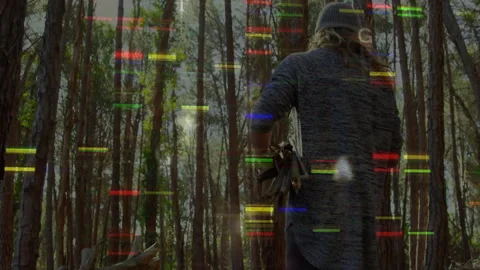 Man stepping forward in pine woods exploring with tech glitch bars summoning Video stock 312695011