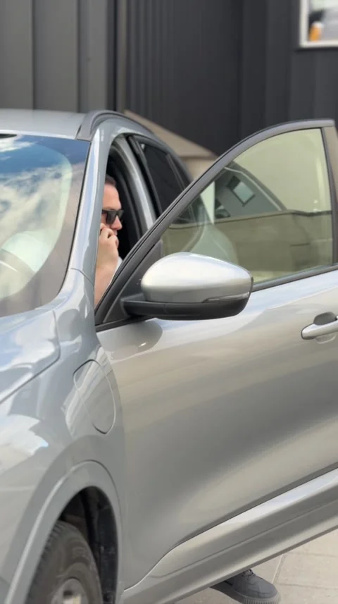 Man stepping out of vehicle side door Stock-Footage 336859489