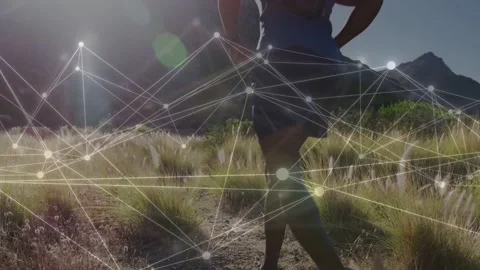 Man stepping on trail, running toward ridge for fitness, node overlay and lens Stock Footage 333602462
