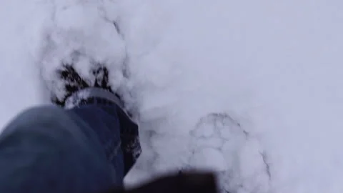 Man steps on deep snow. view from above. Slow motion Stock Footage 85760820