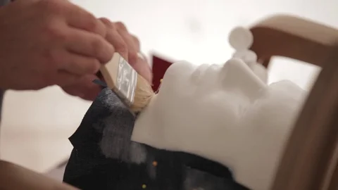 A man sticking to the plaque model Stock Footage 86479962