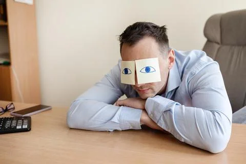 Man, sticky notes and sleeping in office, exhausted and professional Stock Photos
